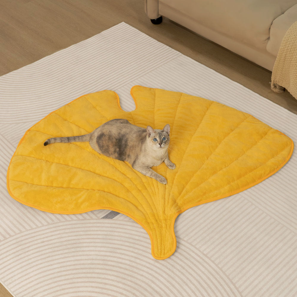 Front view of the cat sleeping bag in ginkgo yellow, showcasing its cozy, enclosed design for stress relief.