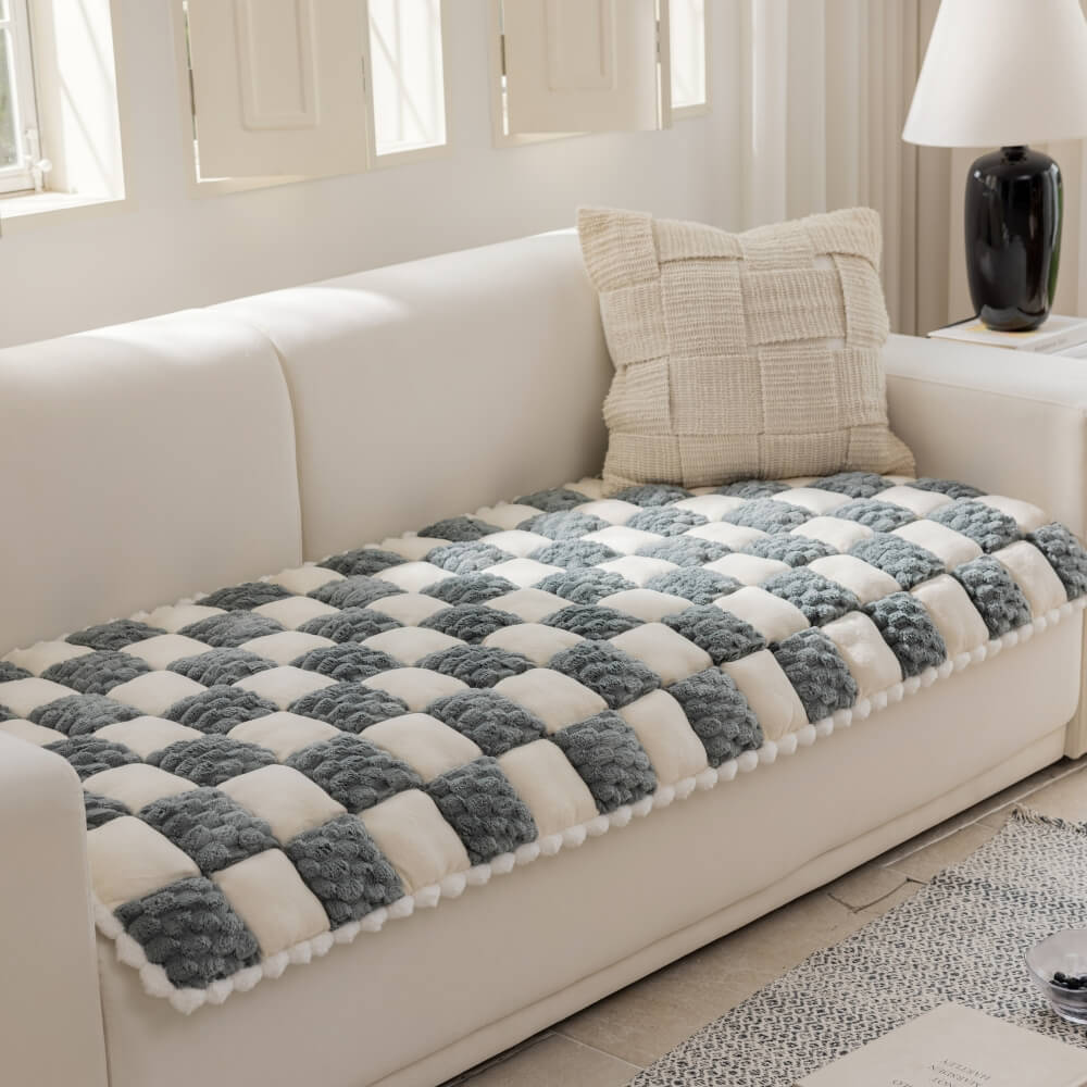 ComfortGuard Plush Pet Sofa Cover on a couch, protecting it from pet hair and scratches