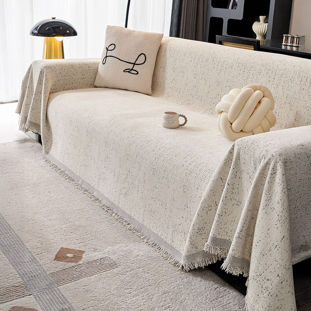 Reversible chenille sofa cover for pets and families, showcasing its soft and breathable fabric.