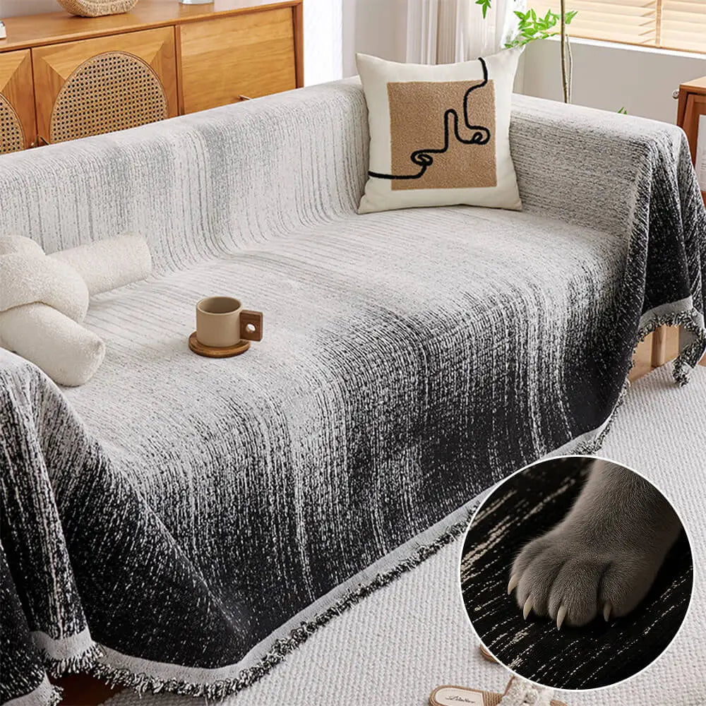 Modern chenille throw cover on a living room sofa, showcasing its elegant ombre gradient design.