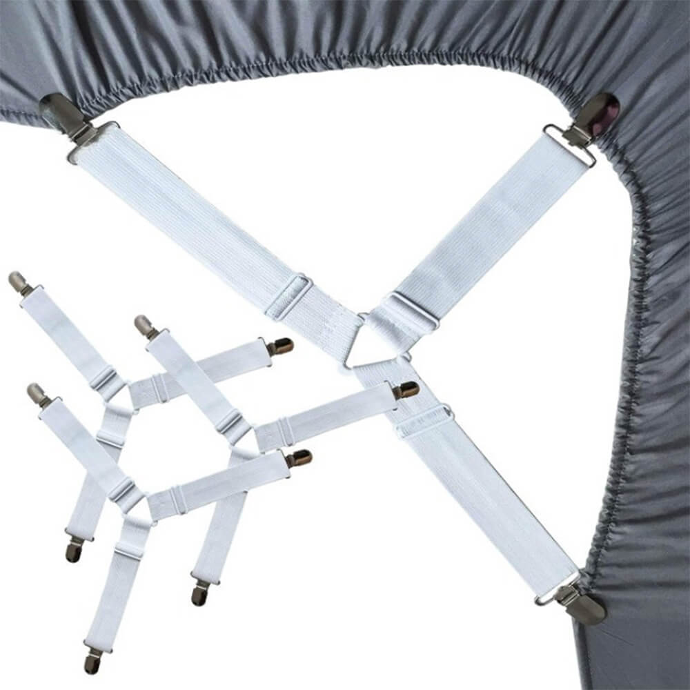 Close-up of adjustable elastic bed sheet straps with rubber grips in use on a mattress.