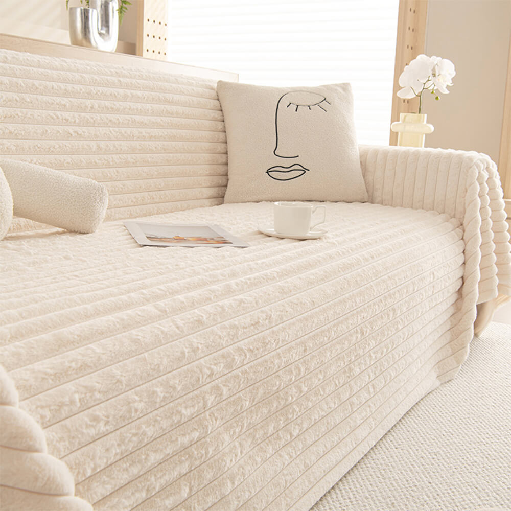 Close-up view of the luxurious faux rabbit fur sofa cover showcasing its plush texture and design.
