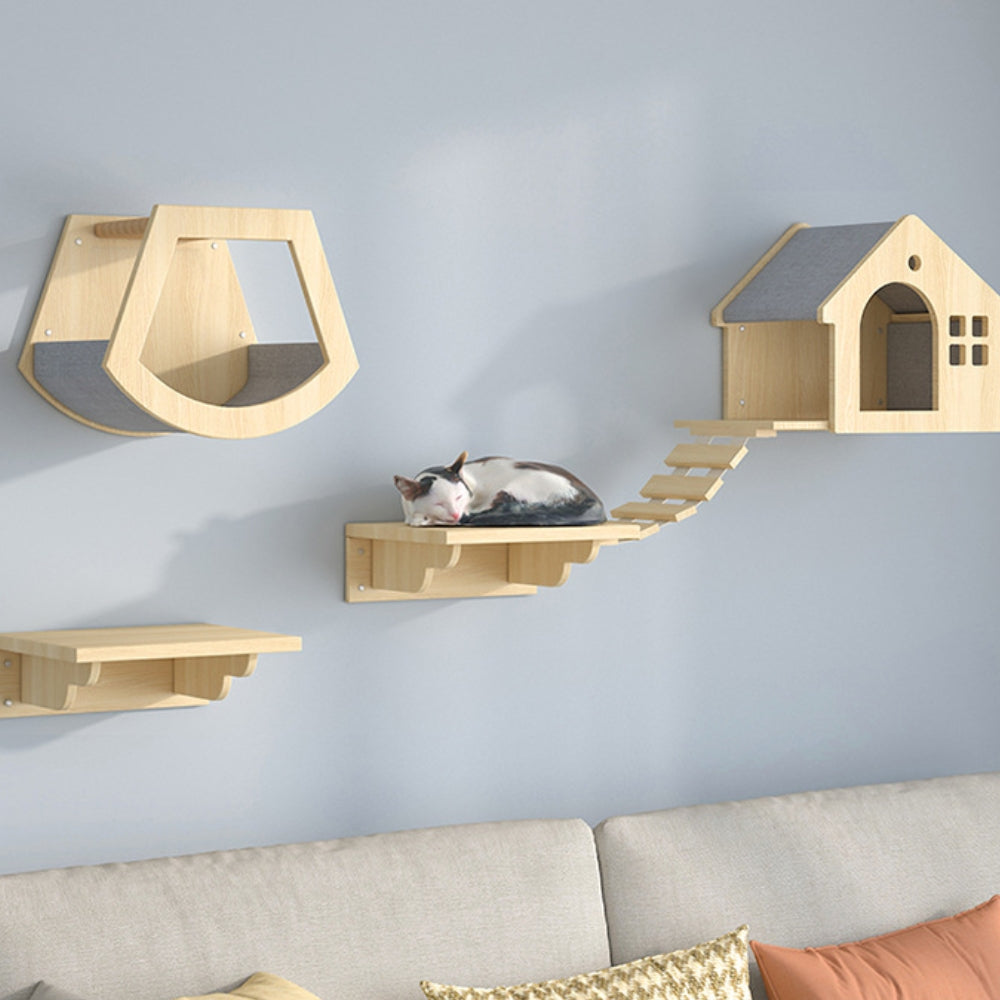 Elevated wooden cat climbing shelves with cozy condos from a side angle.