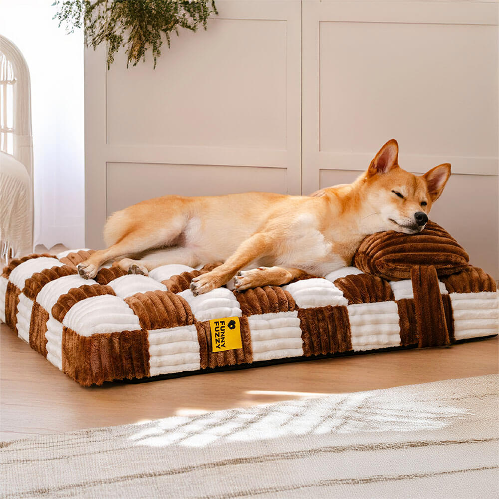 Luxury orthopedic dog bed with plush chessboard design, shown in a home setting
