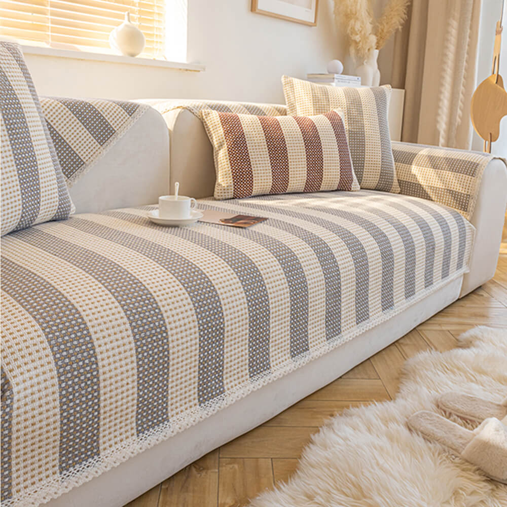 Close-up of the breathable cotton linen fabric on a stylish sofa protector
