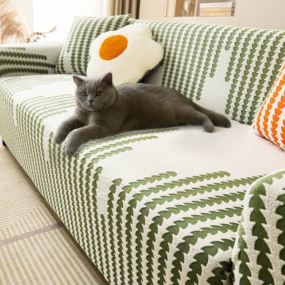 Angled view of herringbone couch cover showcasing full-wrap fit on a 3-seater
