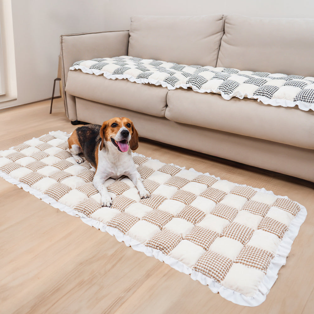 Close-up of soft chenille pet mat with checkered design and anti-slip silicone backing