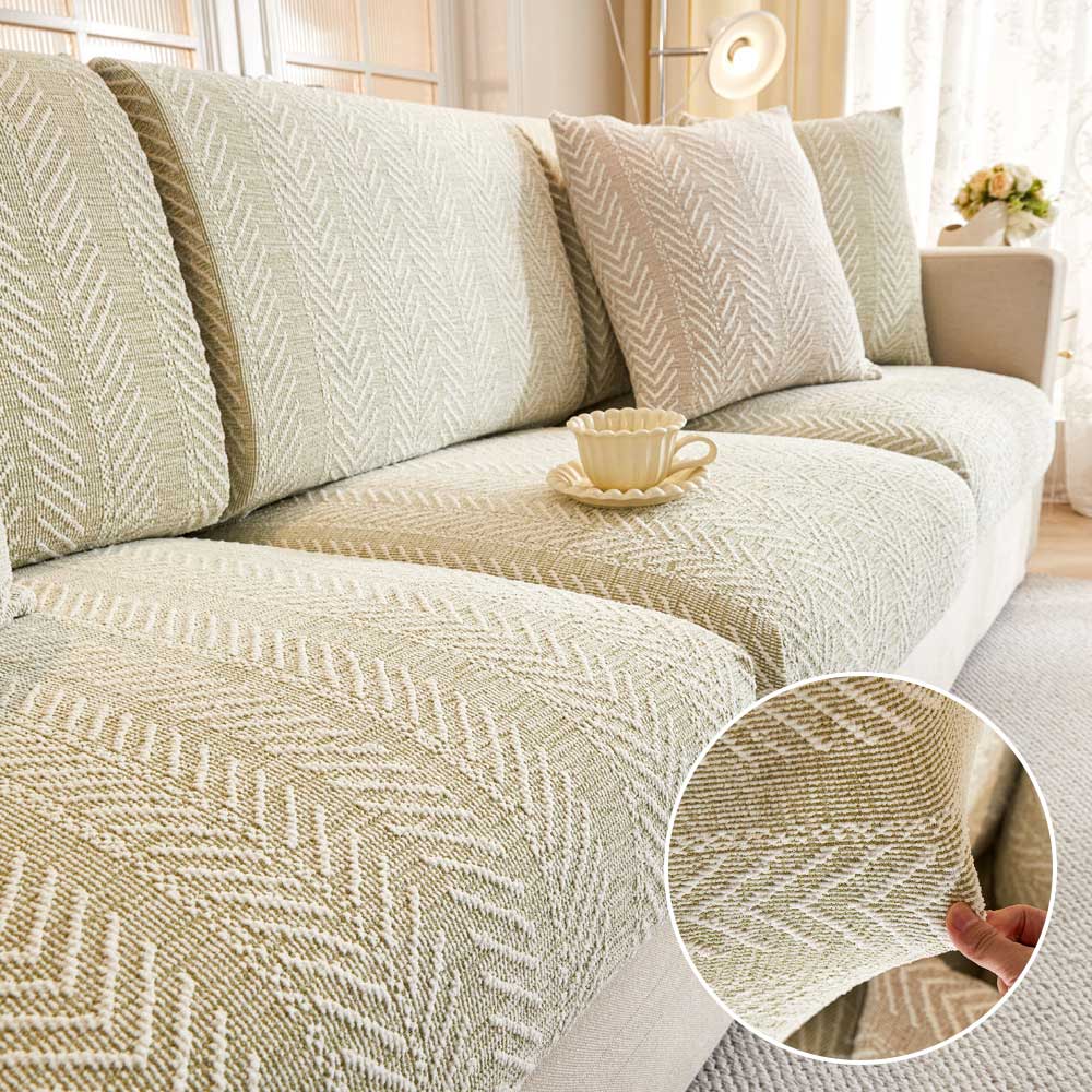 Close-up of herringbone chenille fabric on sofa cover highlighting its plush texture