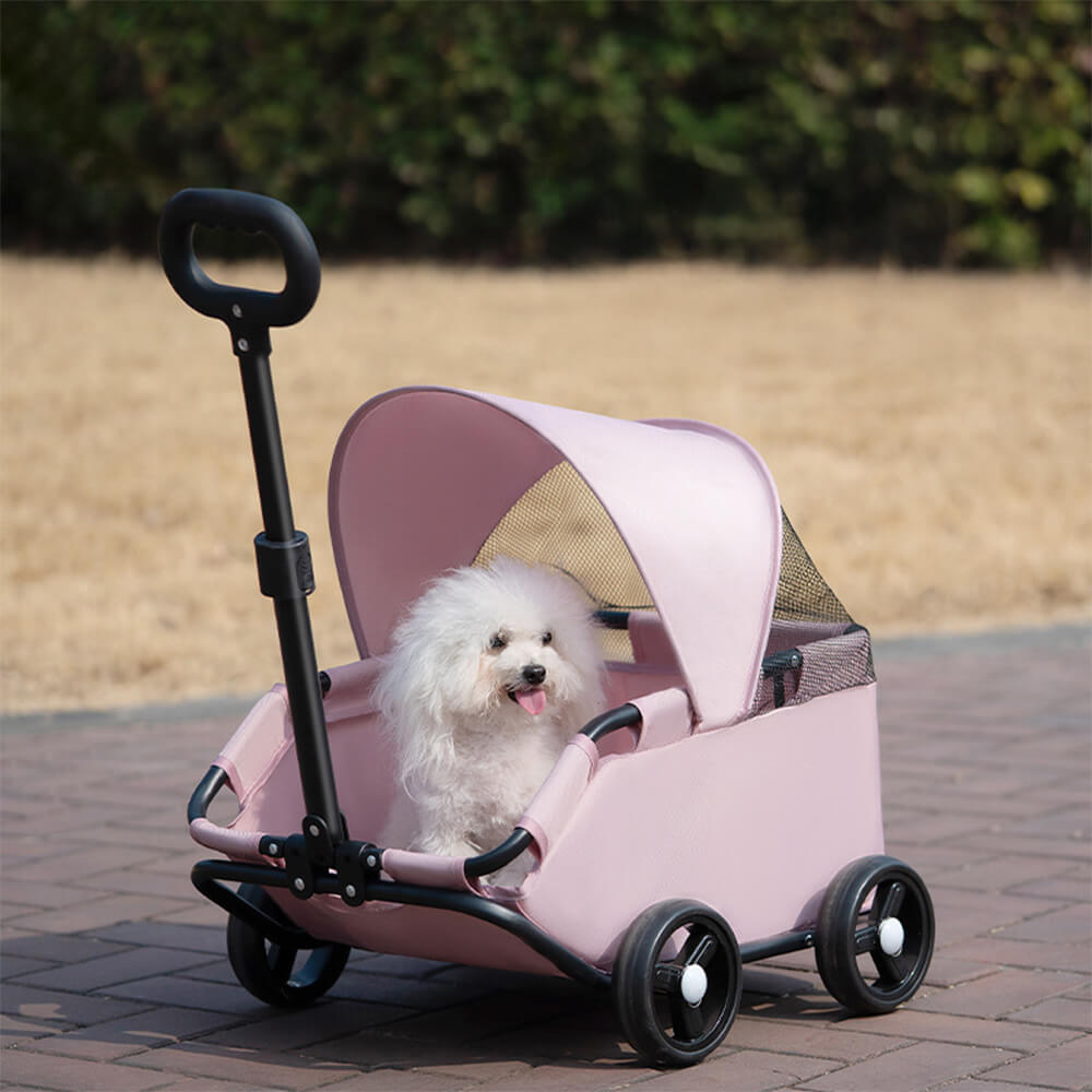 Top view of the foldable pet stroller with canopy extended over small dog
