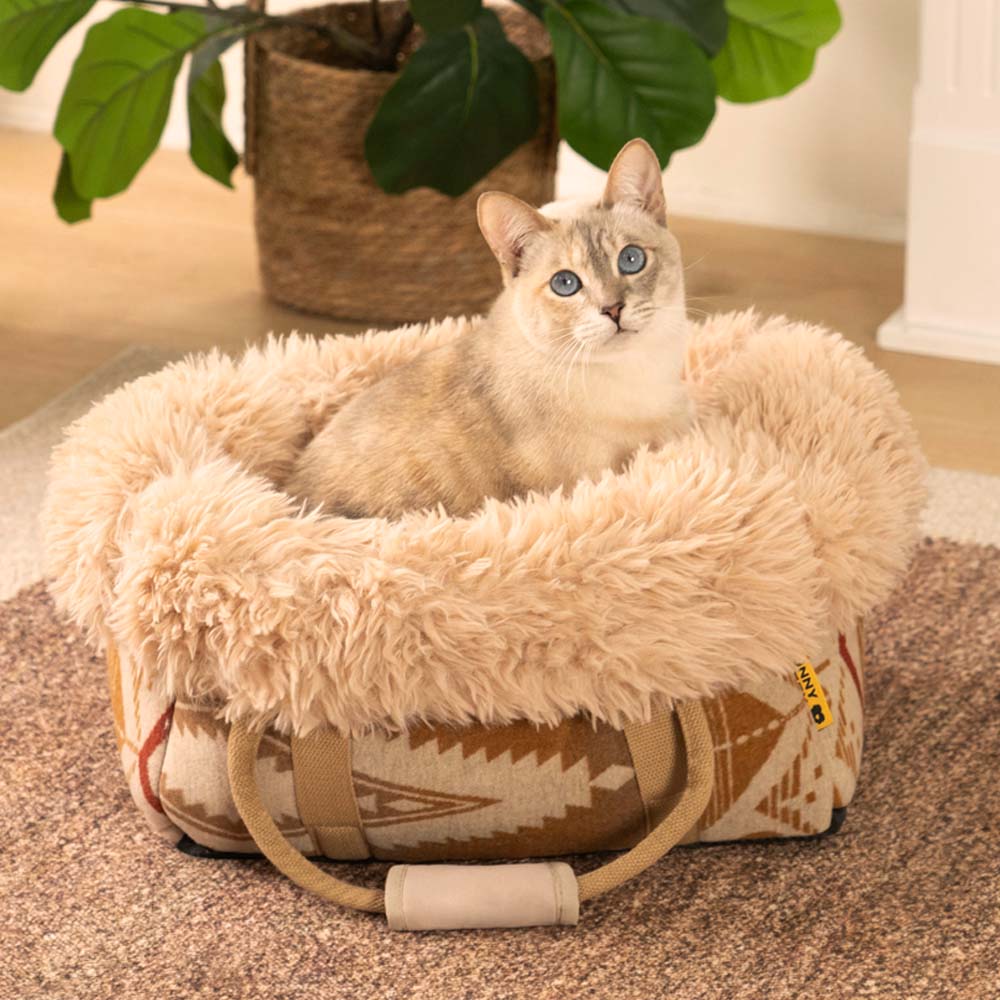 Top view of the reversible cat carrier showing plush interior and boho floral pattern.