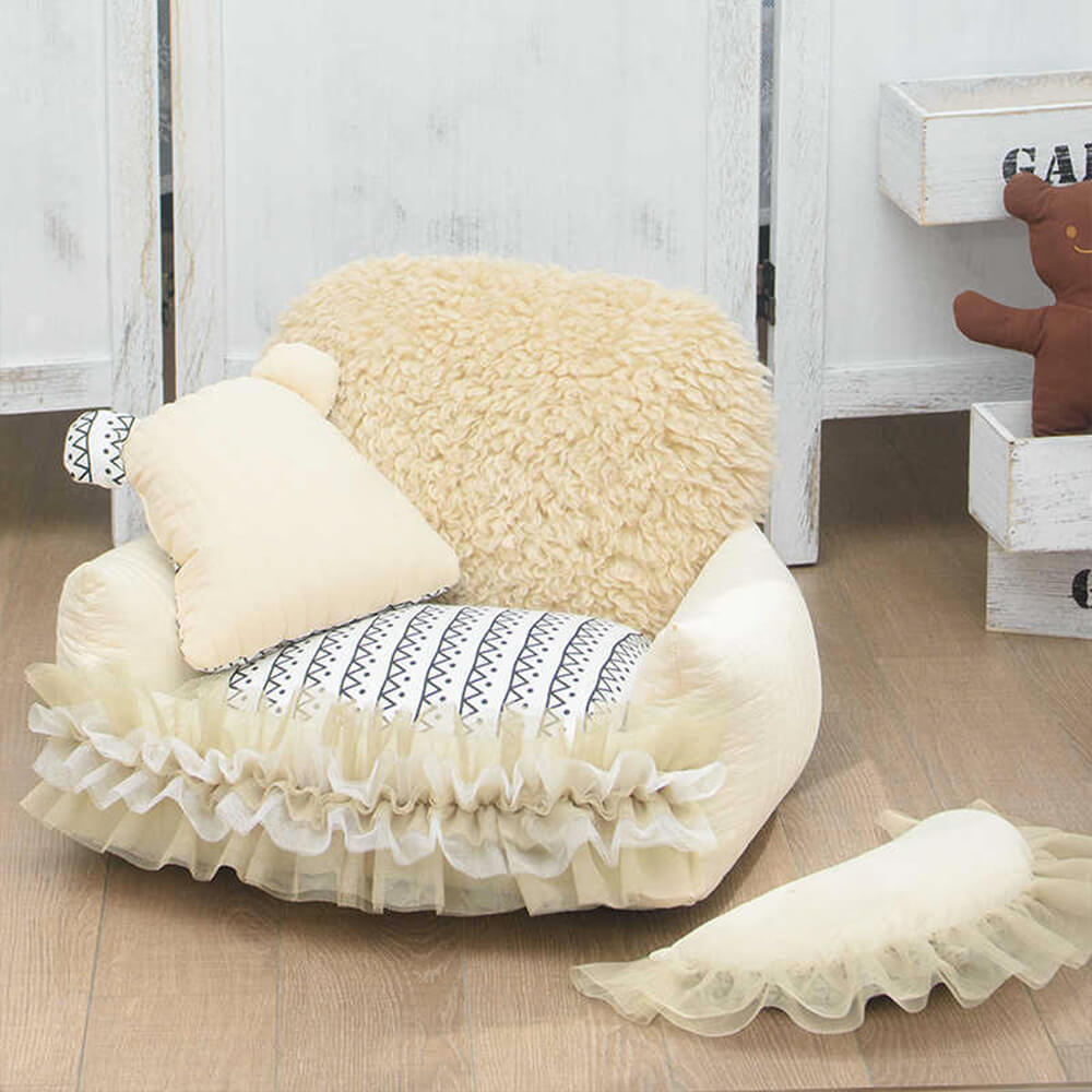 Top view of soft cozy pet bed for small dogs featuring bear and moon pillows