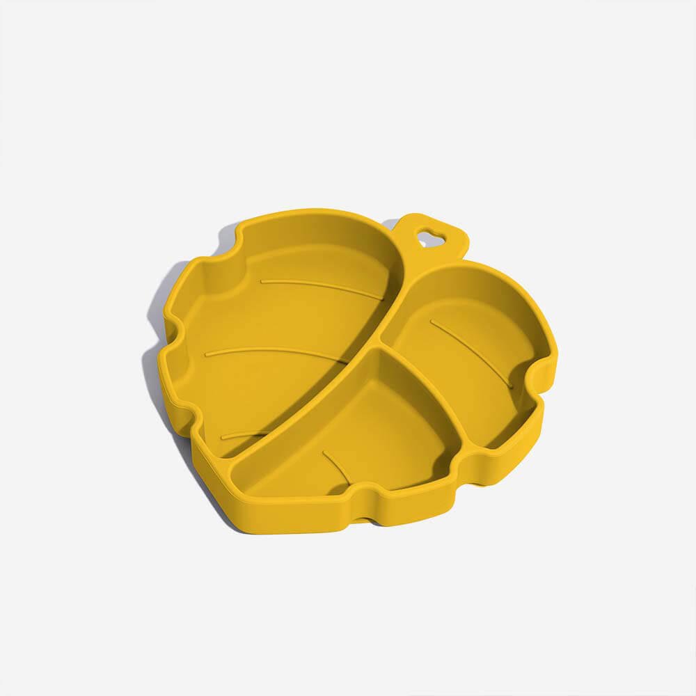 Leaf-shaped non-slip pet bowl on a kitchen counter