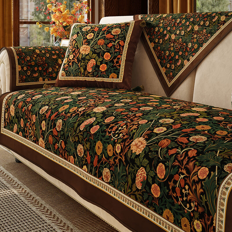 Overhead view of non-slip couch cover in vintage rosewood print on a three-seat sofa.
