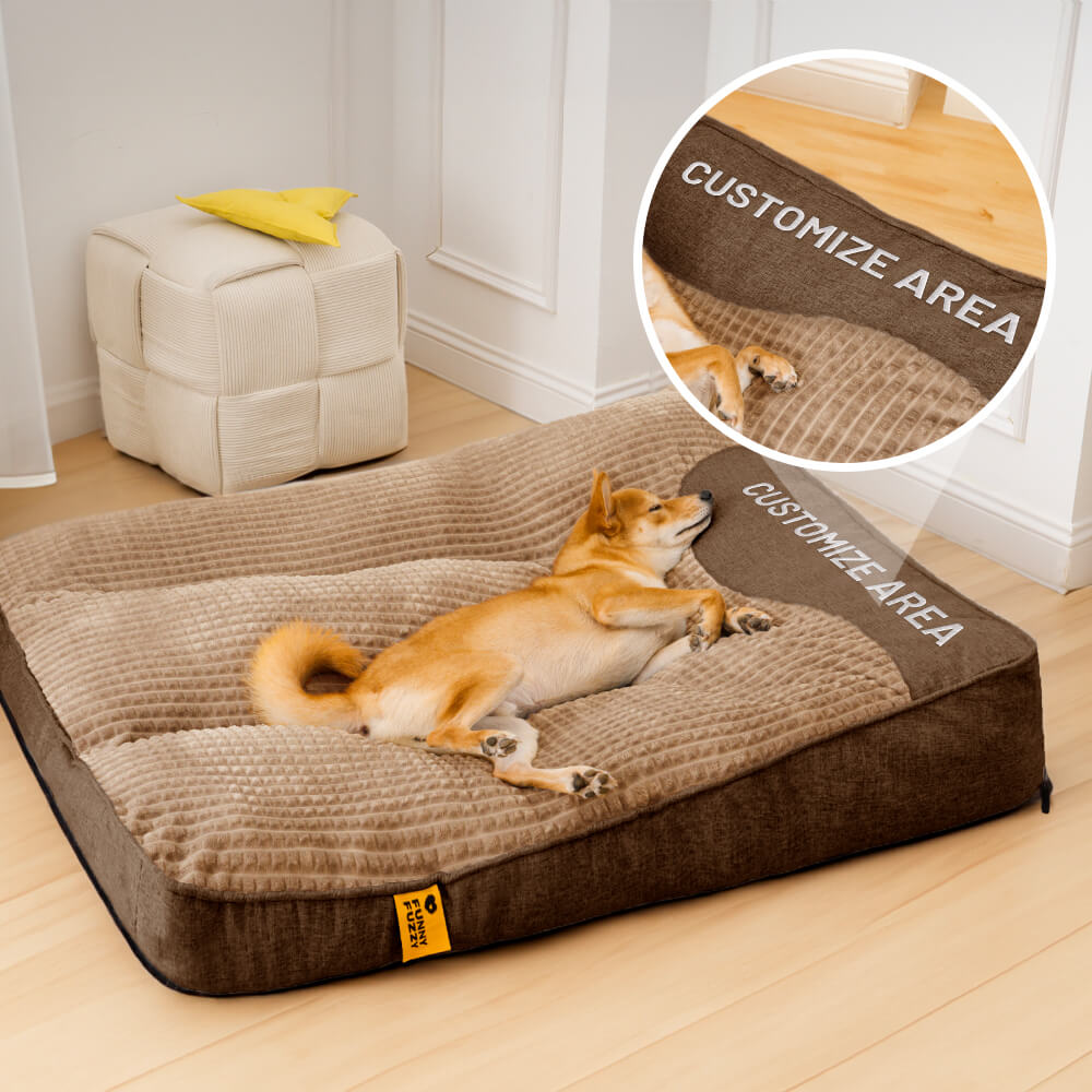 Top view of large dog resting on orthopedic dog bed, showcasing plush cushion and thick headrest