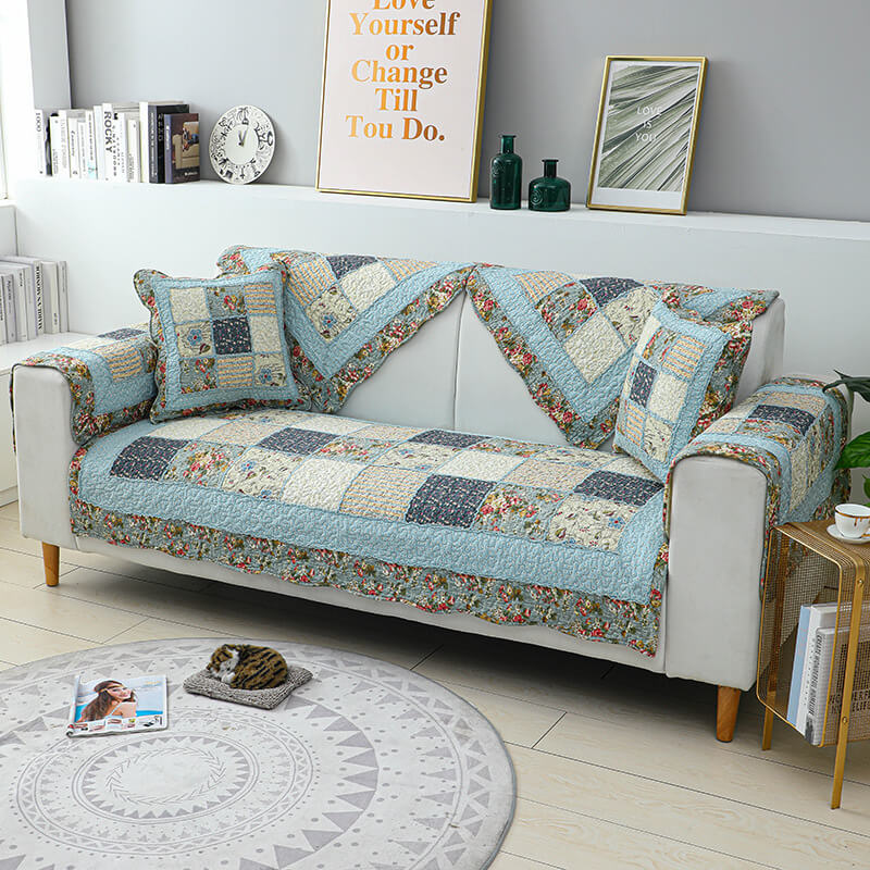 EcoChic Cotton Sofa Slipcover in vintage floral pattern, perfect for pet owners
