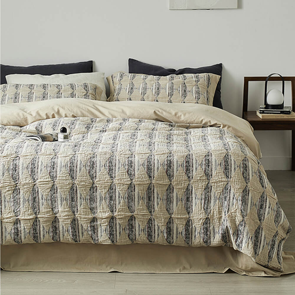 Close-up of diamond jacquard bedding showcasing textured crinkled cotton