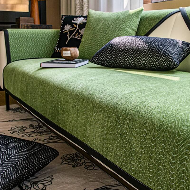 Close-up of luxurious chenille fabric sofa protector with a French elegance design