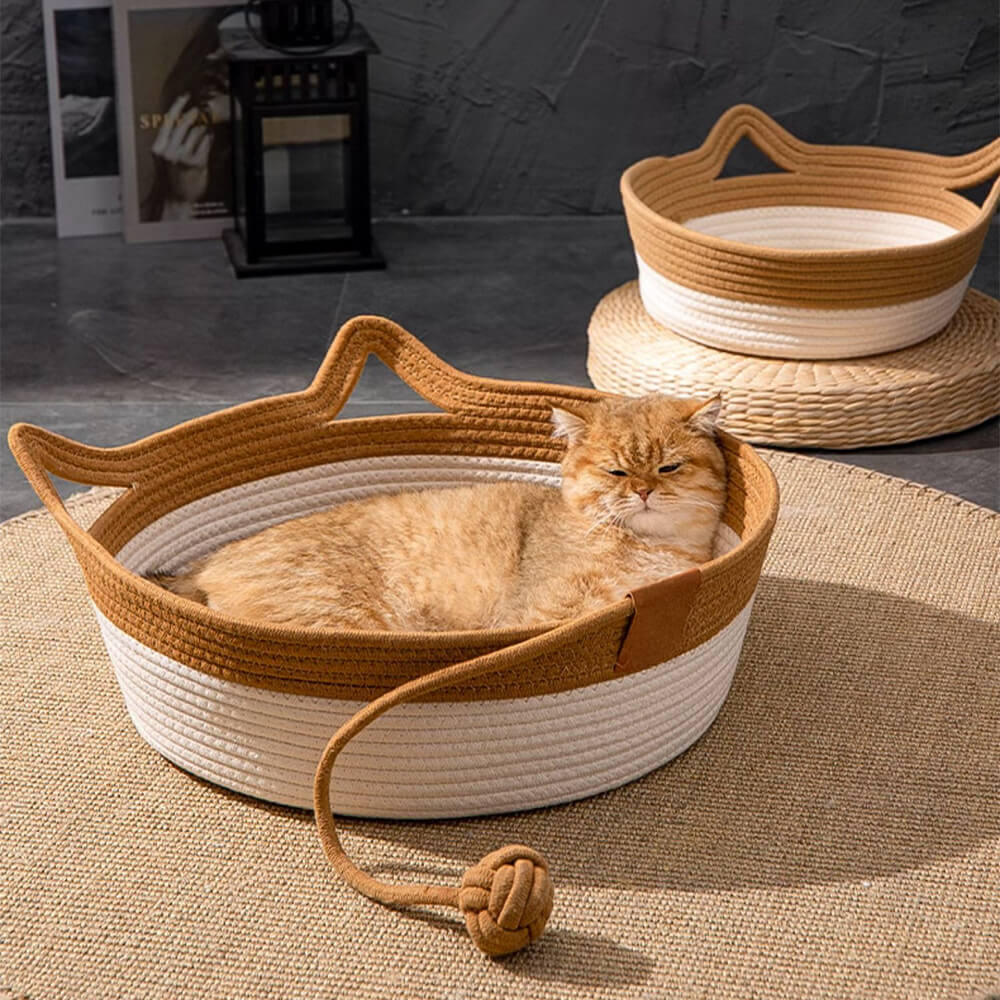 Close-up view of a woven cat nest with raised edges and scratch pad