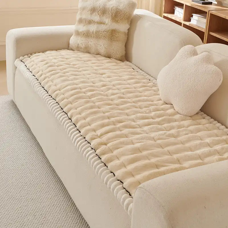 Front view of couch with FluffEase slipcover in neutral beige, highlighting plush texture.