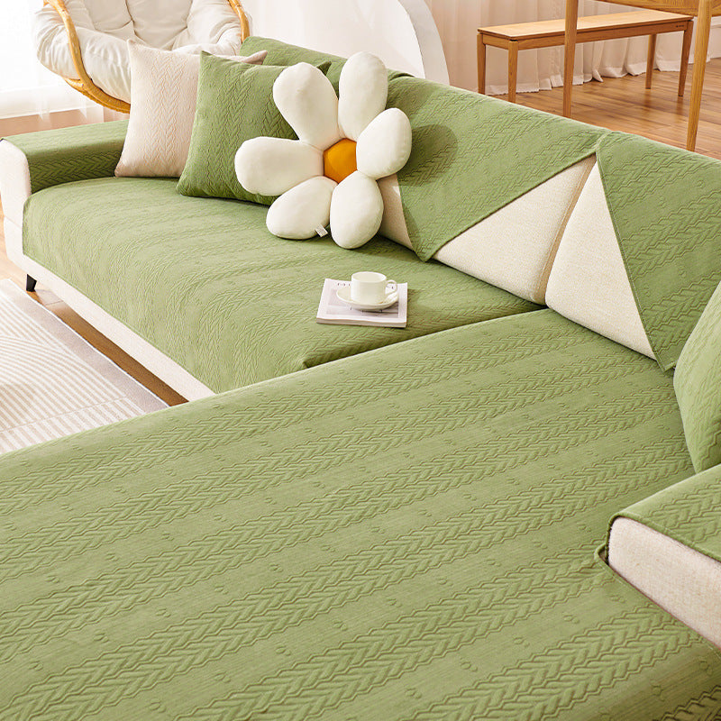 Chenille sofa cover on a living room couch