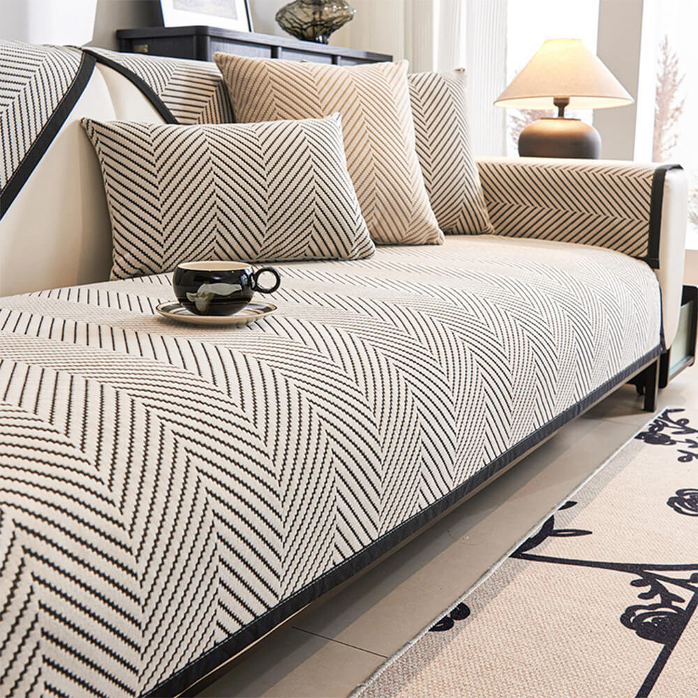 Close-up of the elegant two-tone herringbone couch cover showcasing its soft texture