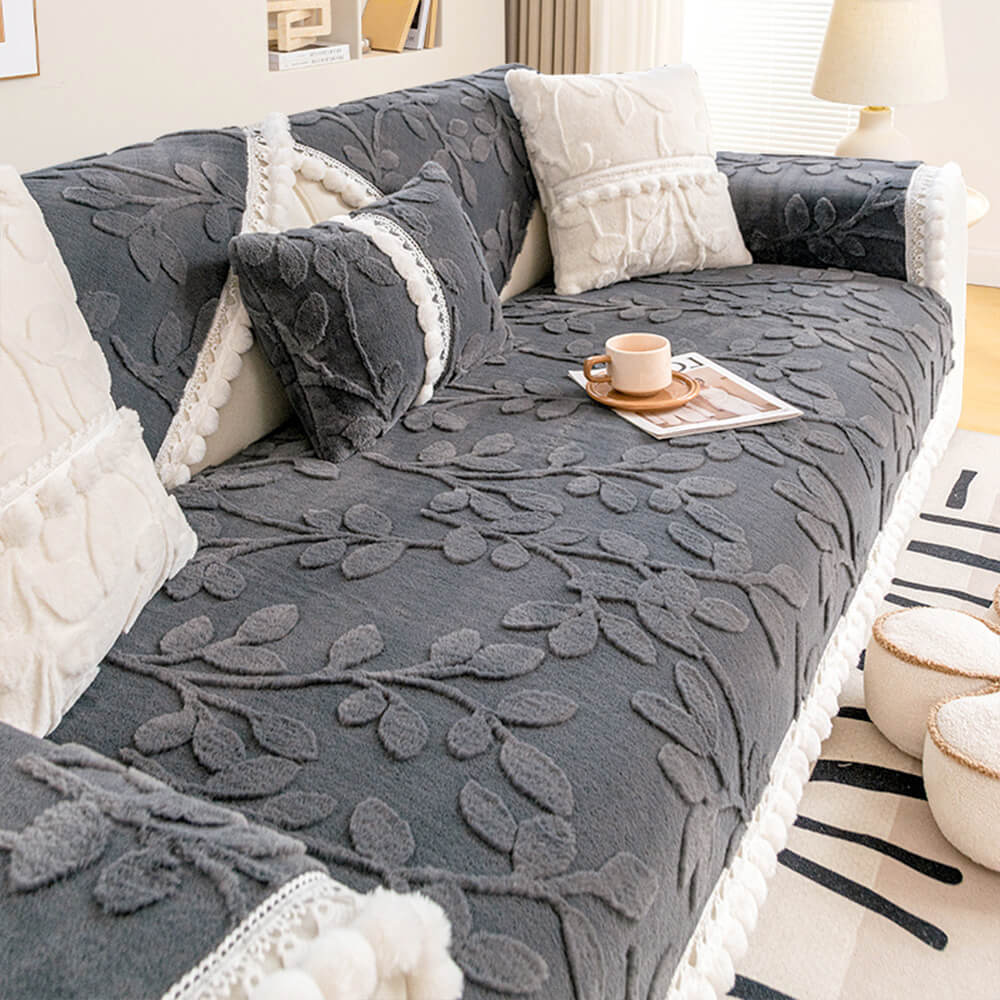 Elegant branch jacquard plush non-slip couch cover displayed on a modern sofa.