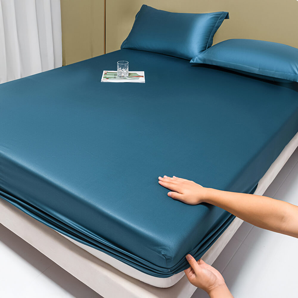 Silky Lyocell fitted sheet on a modern bed, emphasizing its smooth, breathable fabric.