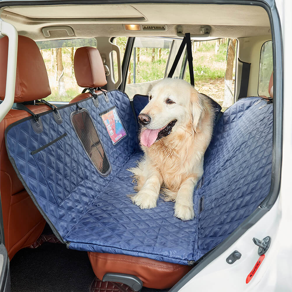 Waterproof dog car seat cover with storage pockets in a car interior