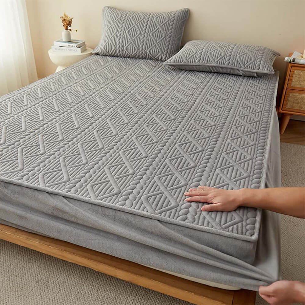 Wheat Inspired Quilted Milk Velvet Fitted Sheet on a bed