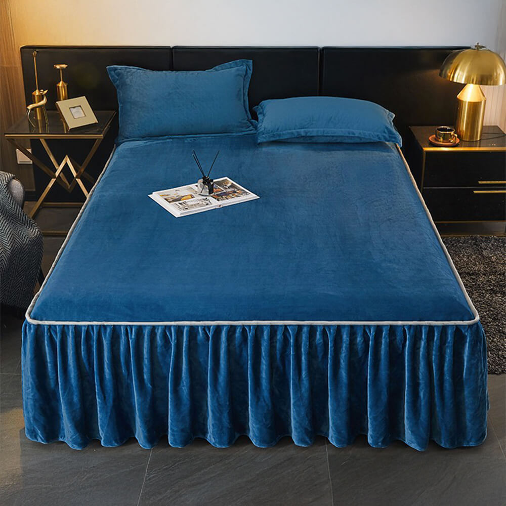 Luxury milk velvet mattress cover protector with elegant bed skirt draped over a stylish bed frame.