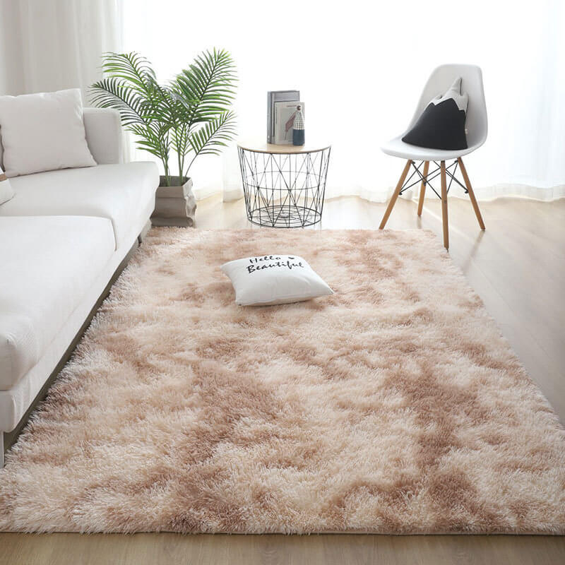 Angled top view of the tie dye rug showing plush texture and vibrant swirls