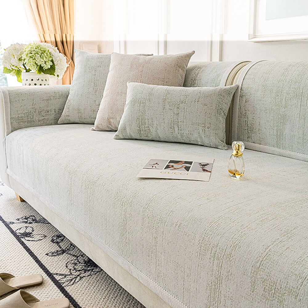 Luxury chenille sofa cover protector on a modern living room sofa