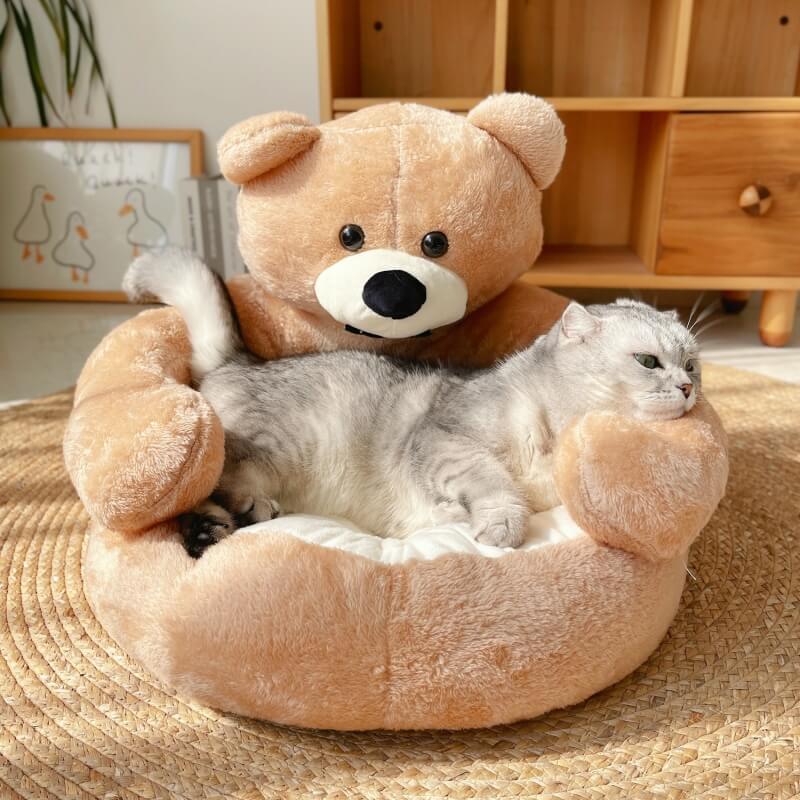 Cuddle Bear Detachable Cat Bed in a cozy living room setting, showcasing its cute and inviting design.