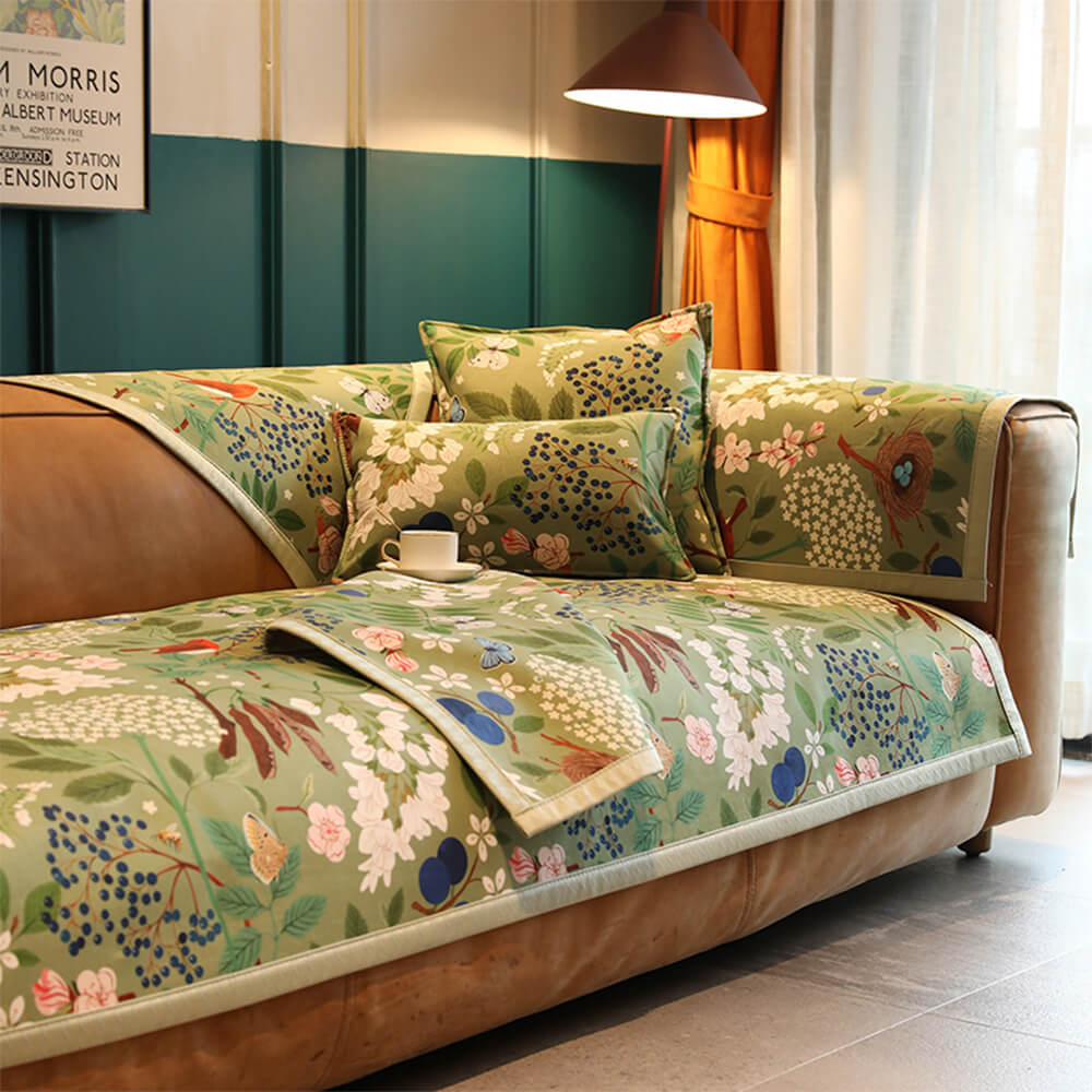 Bohemian floral chenille sofa cover on a living room couch, showcasing its vibrant patterns and comfortable texture.