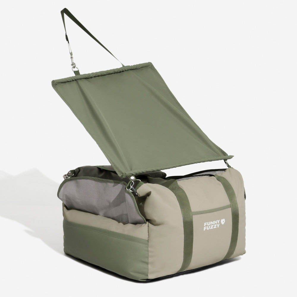 Side angle of the dog car seat installed on passenger seat with sunshade fully extended