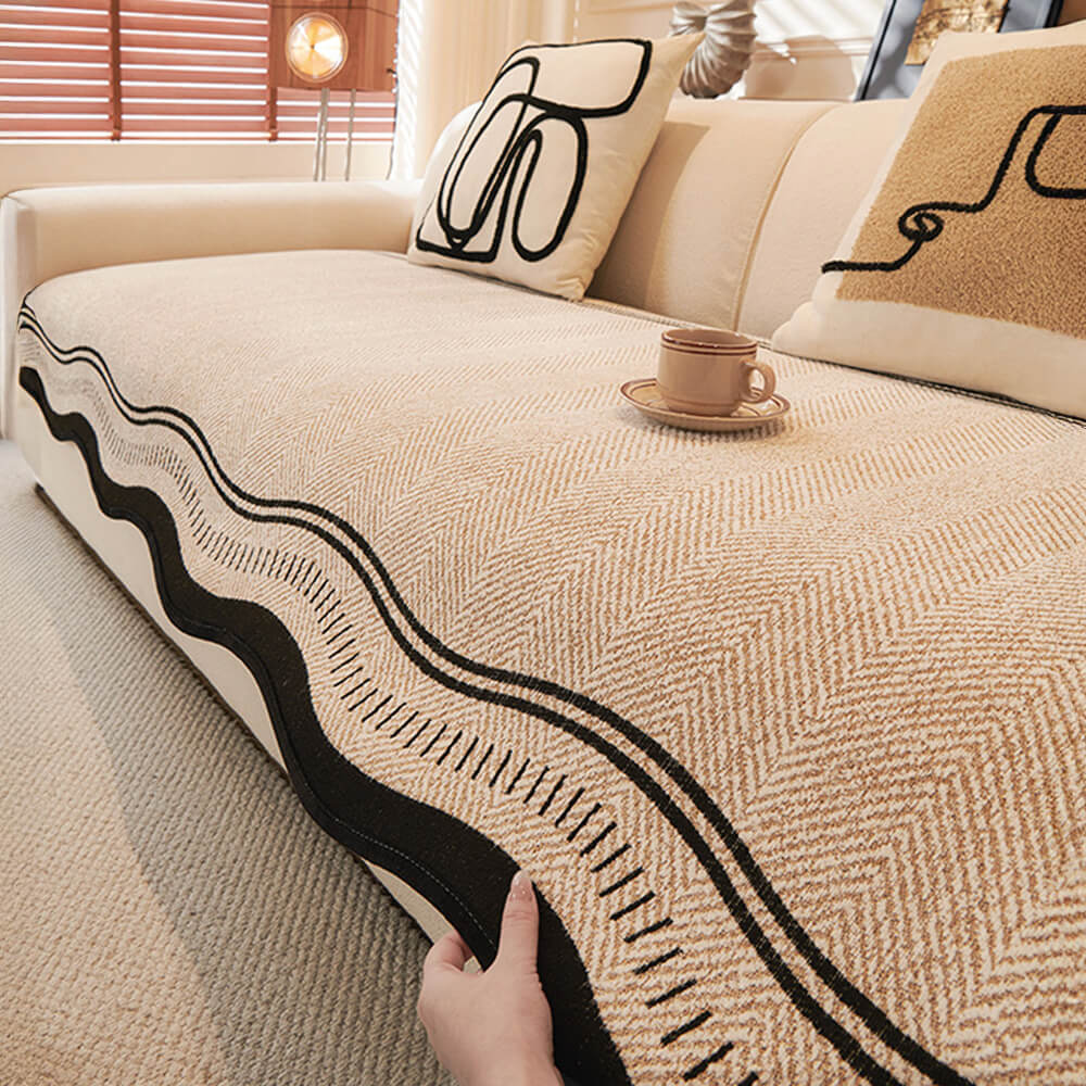 Elegant non-slip chenille couch cover showcasing wavy edges in a cozy living room setting.