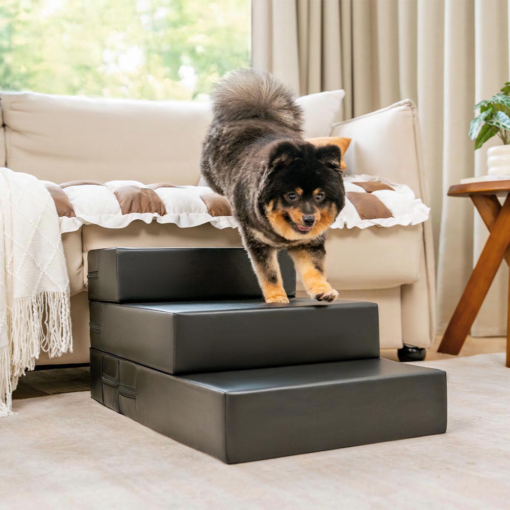 Modular pet stairs stacked for sofa access — waterproof PU cover shown from side angle