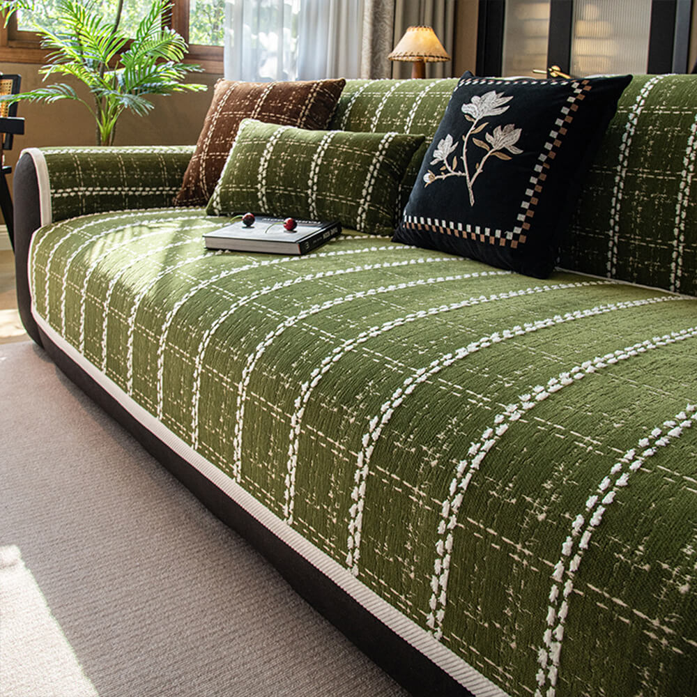 Top view of chenille sofa slipcover with checkered design on modern gray couch.