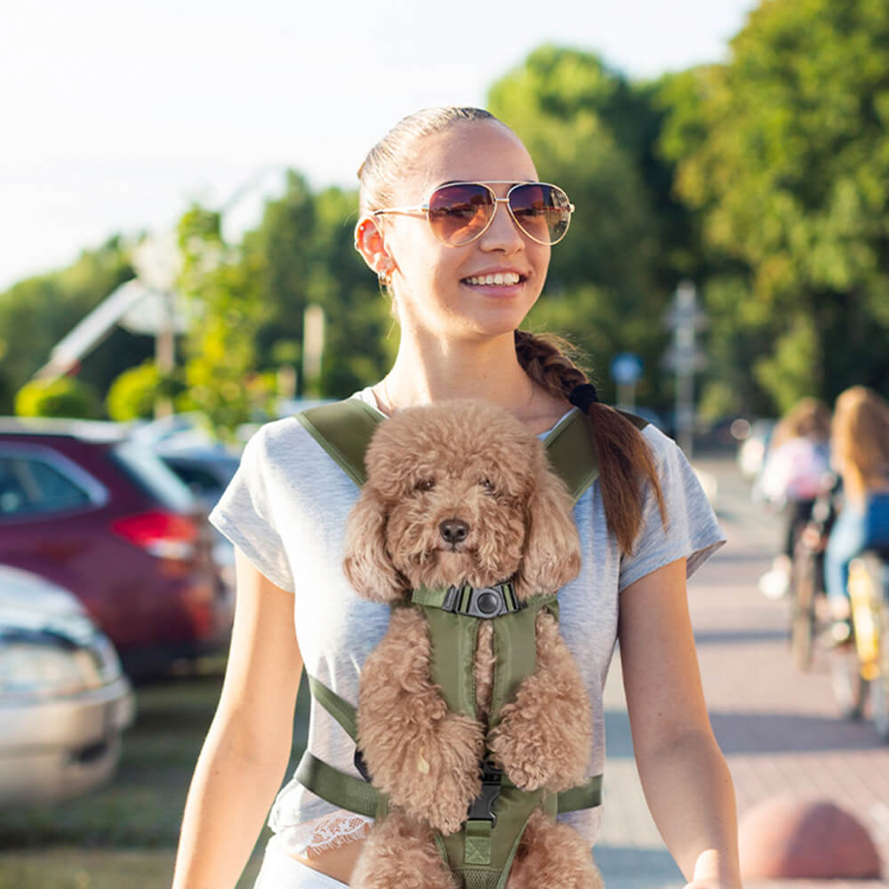 Adventure Buddy Dog Carrier Backpack viewed from the side with a dog comfortably inside, highlighting its breathable design.