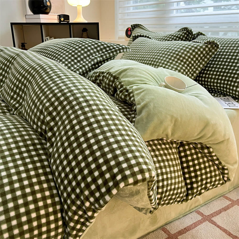 Luxury plaid milk velvet bed sheets set on a neatly made bed, showcasing its rich texture and warmth.