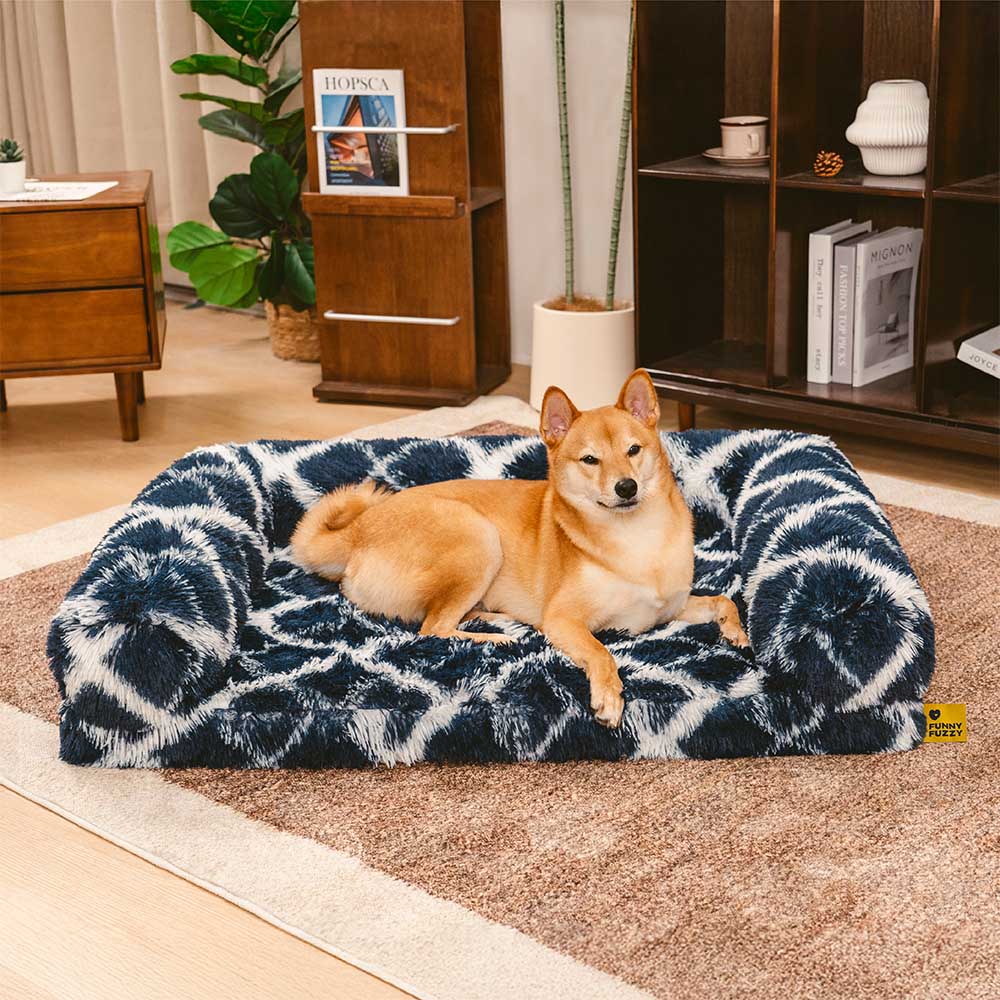 Trendy plaid orthopedic dog sofa bed showcasing cozy faux fur lining and plush bolsters.