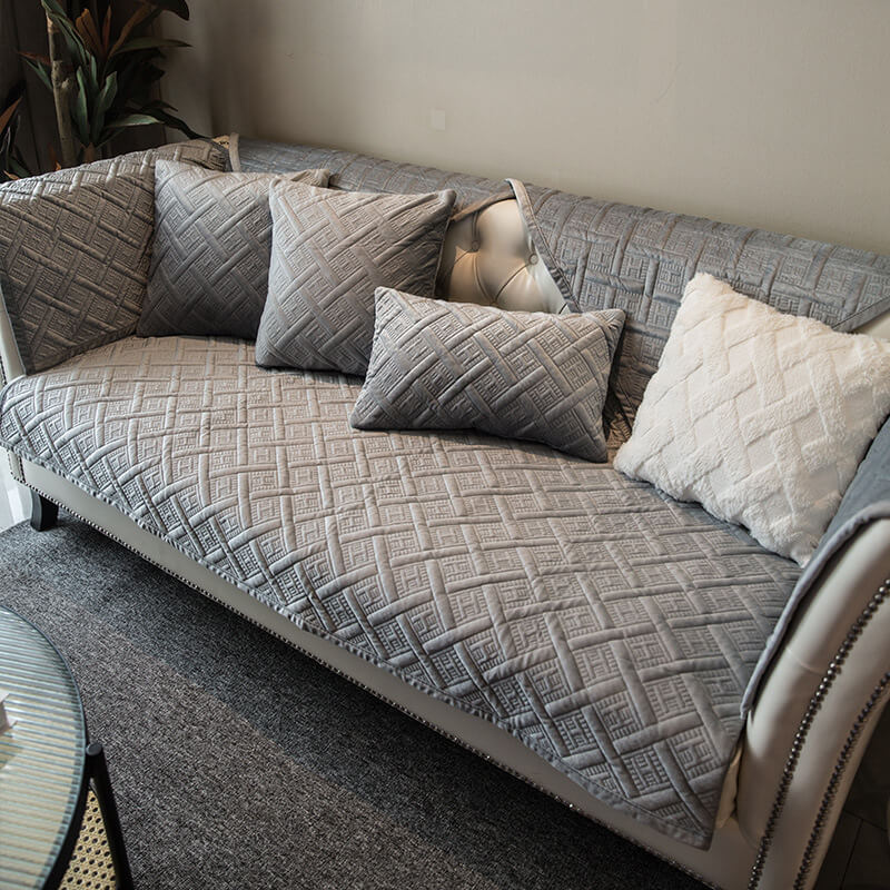 Close-up of quilted velvet texture showing luxurious stitching and rich color tone