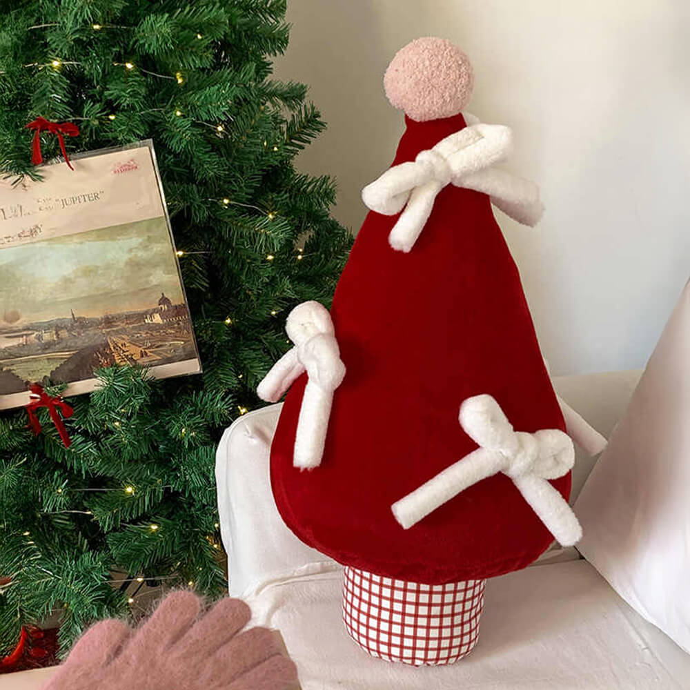 Faux Rabbit Fur Christmas tree pillow displayed on a cozy sofa with holiday decorations