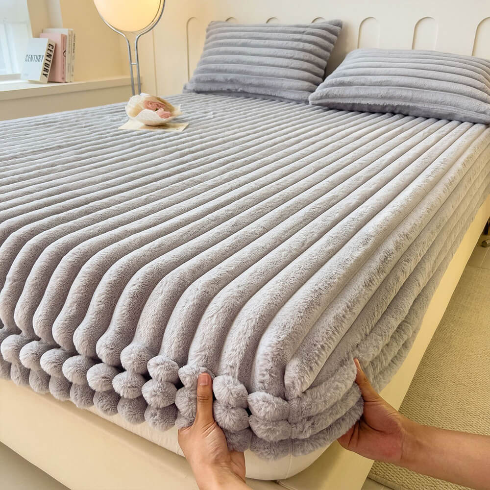 CozyFaux King Size Mattress Protector & Fitted Sheet Set on a bed