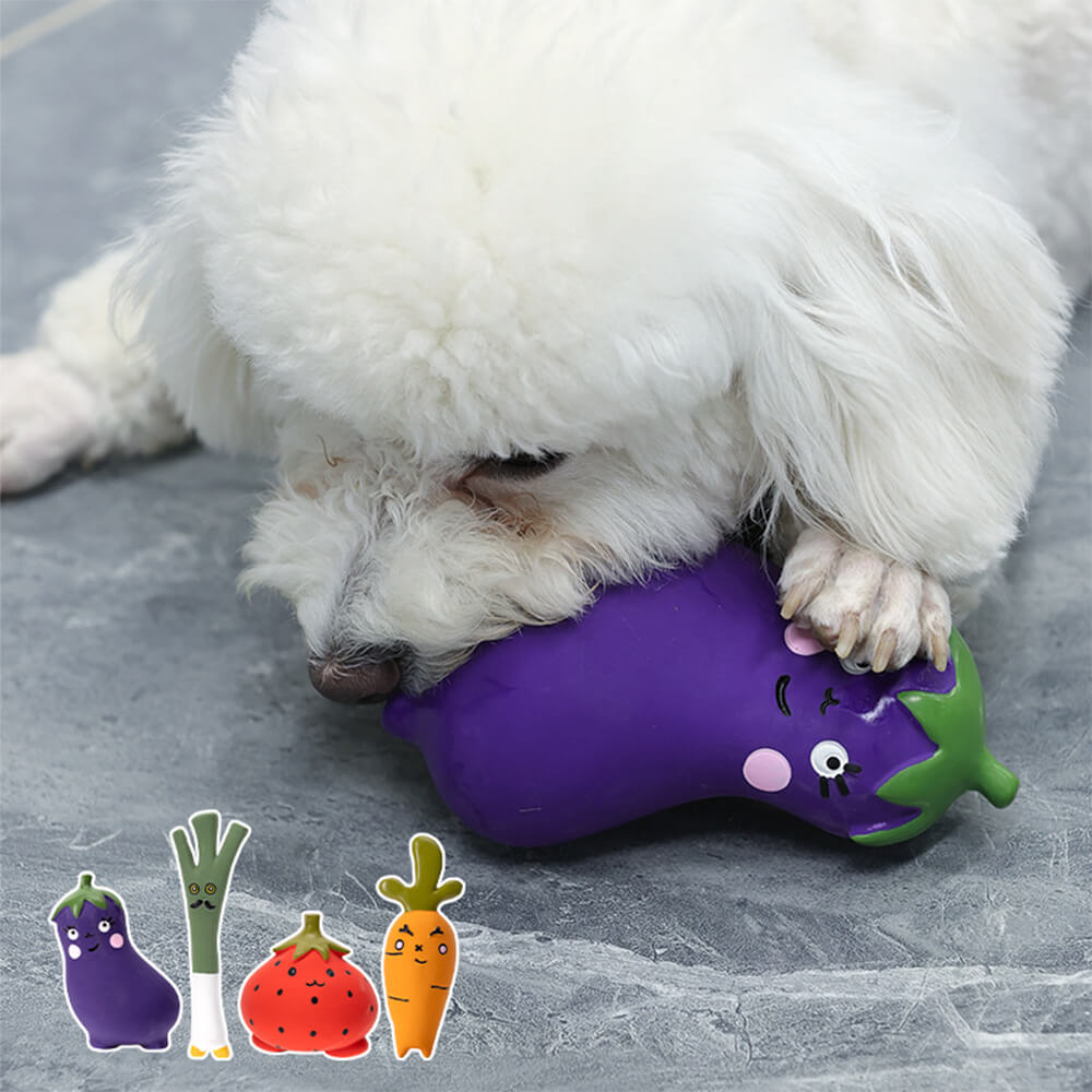 Close-up of carrot-shaped latex dog toy with squeaker for fun playtime.