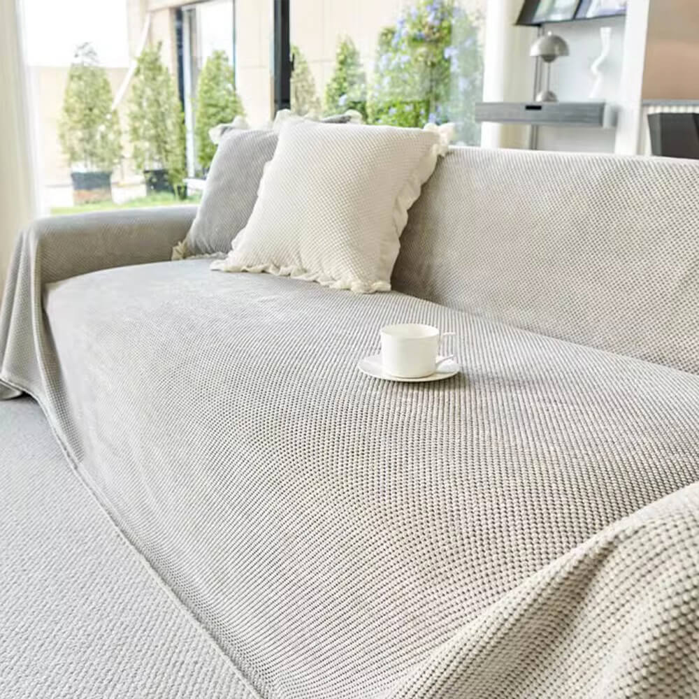 Soft corduroy couch cover with waffle weave texture on a sofa