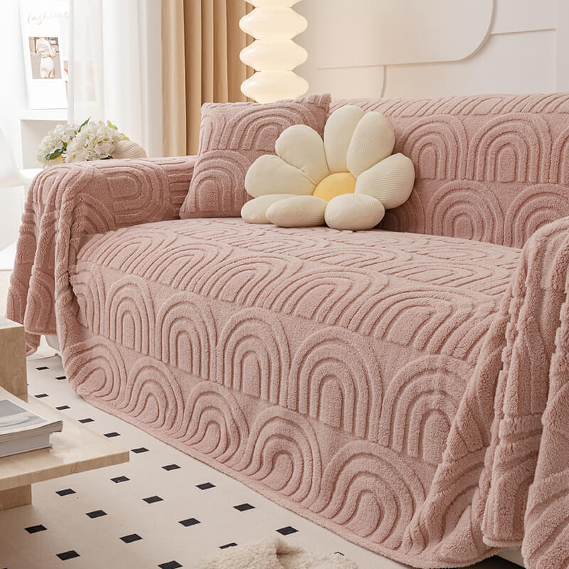 Plush Arch couch cover displayed on a stylish sofa, featuring a beautiful arch design.