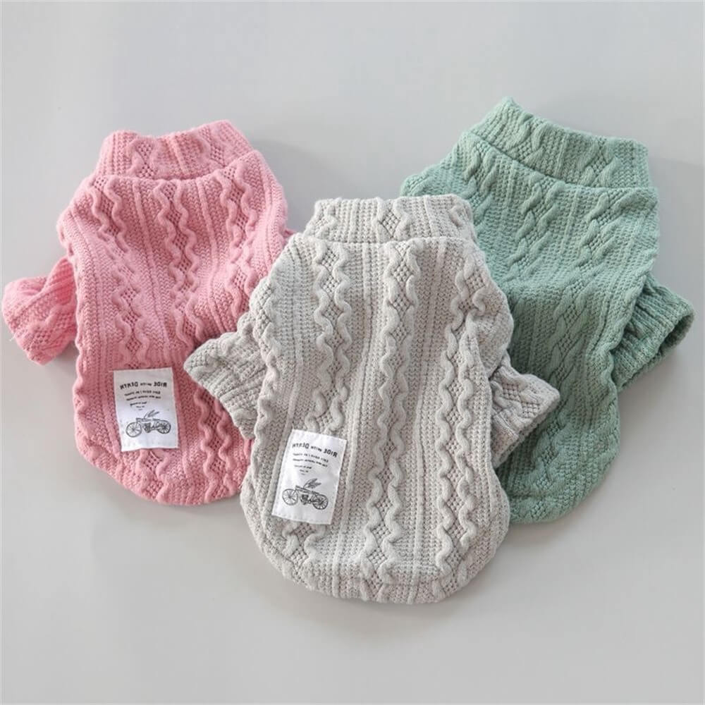 Cable knit dog sweater in pink, gray, and green colors