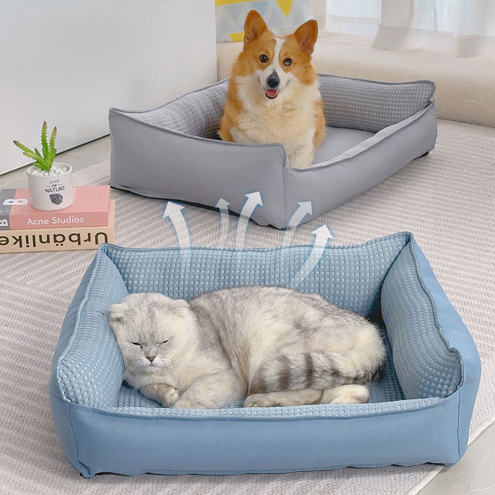 Cooling Comfort Dog Sofa Bed - Side view showing the breathable interior and three-sided support