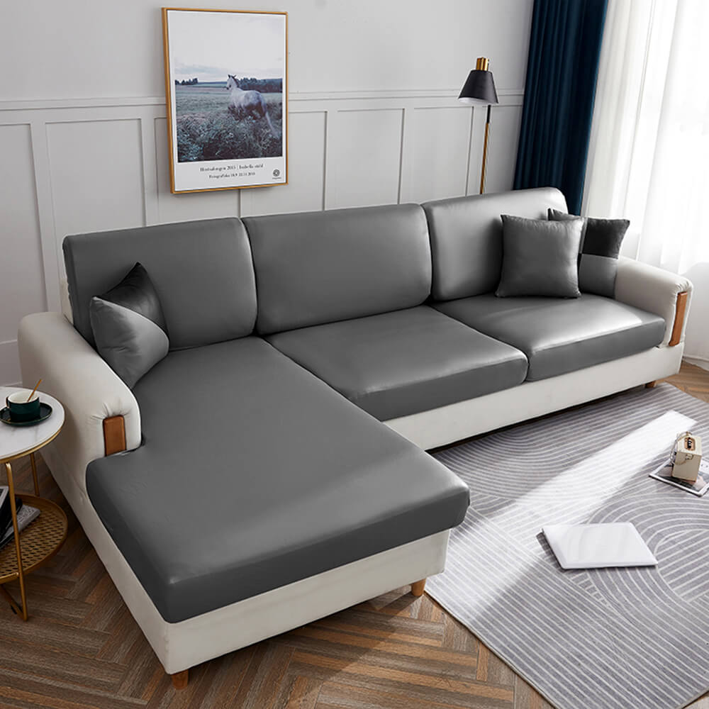 ProtecMax Leather Stretch Couch Cover on a modern sofa, showcasing its sleek design and waterproof features.